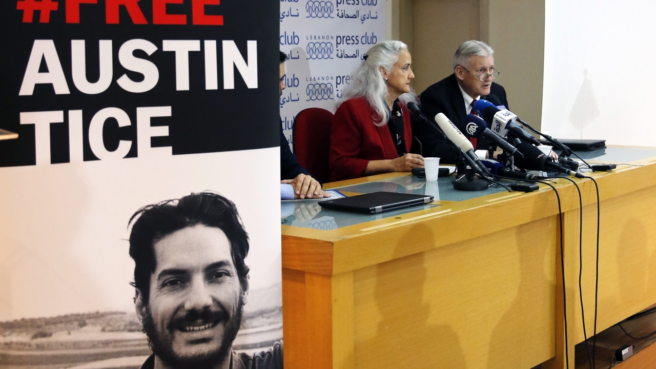 Marc and Debra Tice, the parents of Austin Tice, who is missing in Syria, speak during a press conference