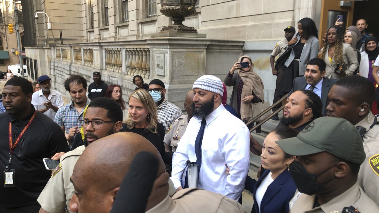 Adnan Syed, center, leaves the Elijah E. Cummings Courthouse in Baltimore