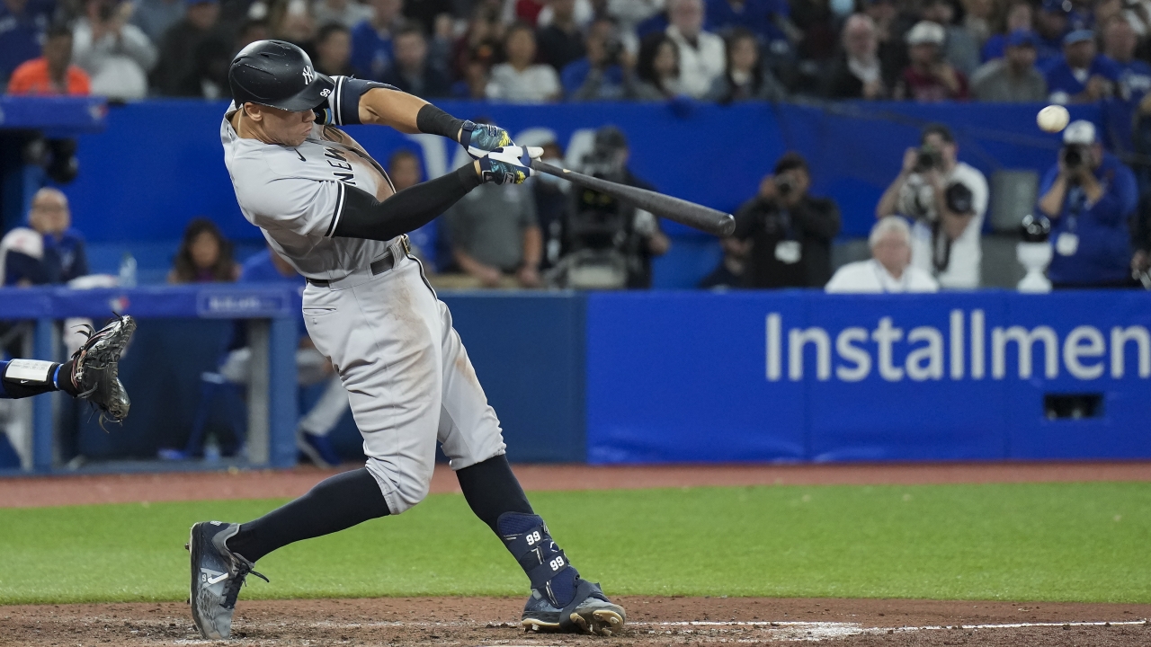 New York Yankees' Aaron Judge hits a home run.