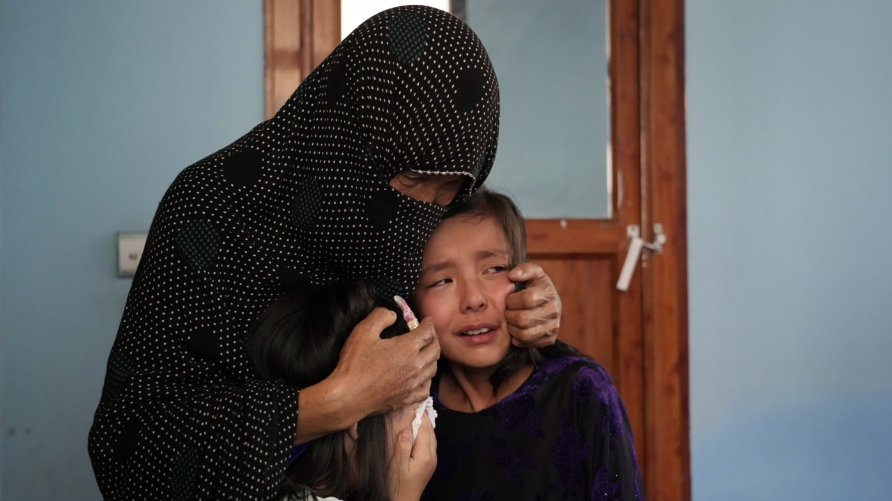 Family mourns after a suicide bombing.