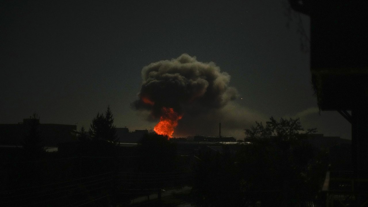 Smoke rises after big explosions in Kharkiv, Ukraine, early Saturday, Oct. 8, 2022.