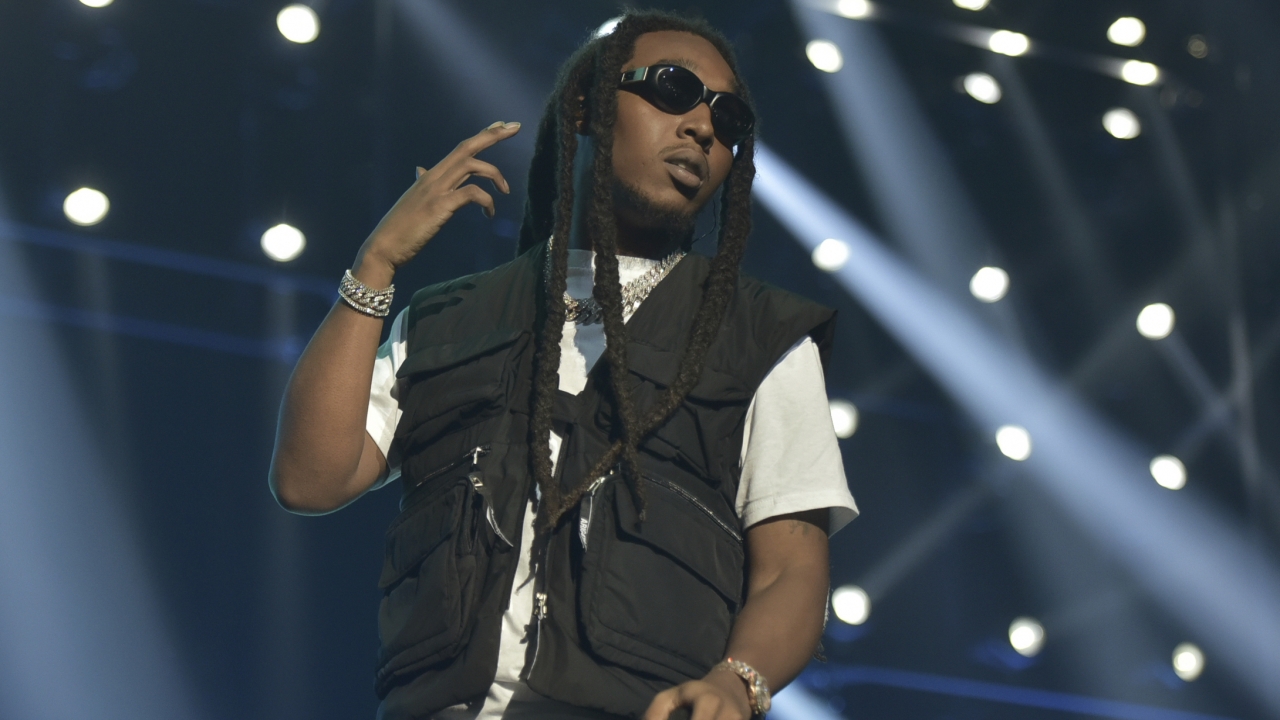 Takeoff of the group Migos performs at the BET Awards.