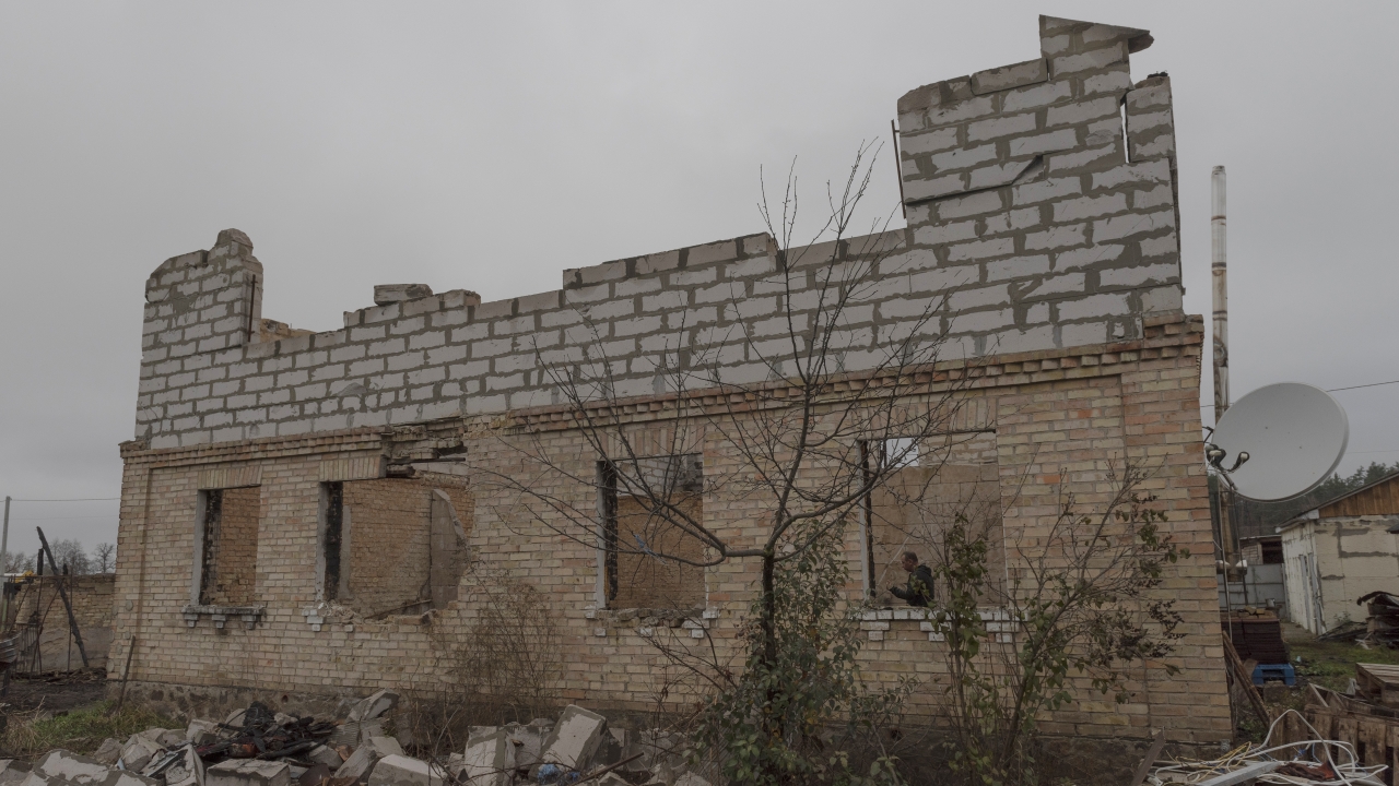 A man in the remains of his house destroyed by fighting outside of Kyiv, Ukraine.