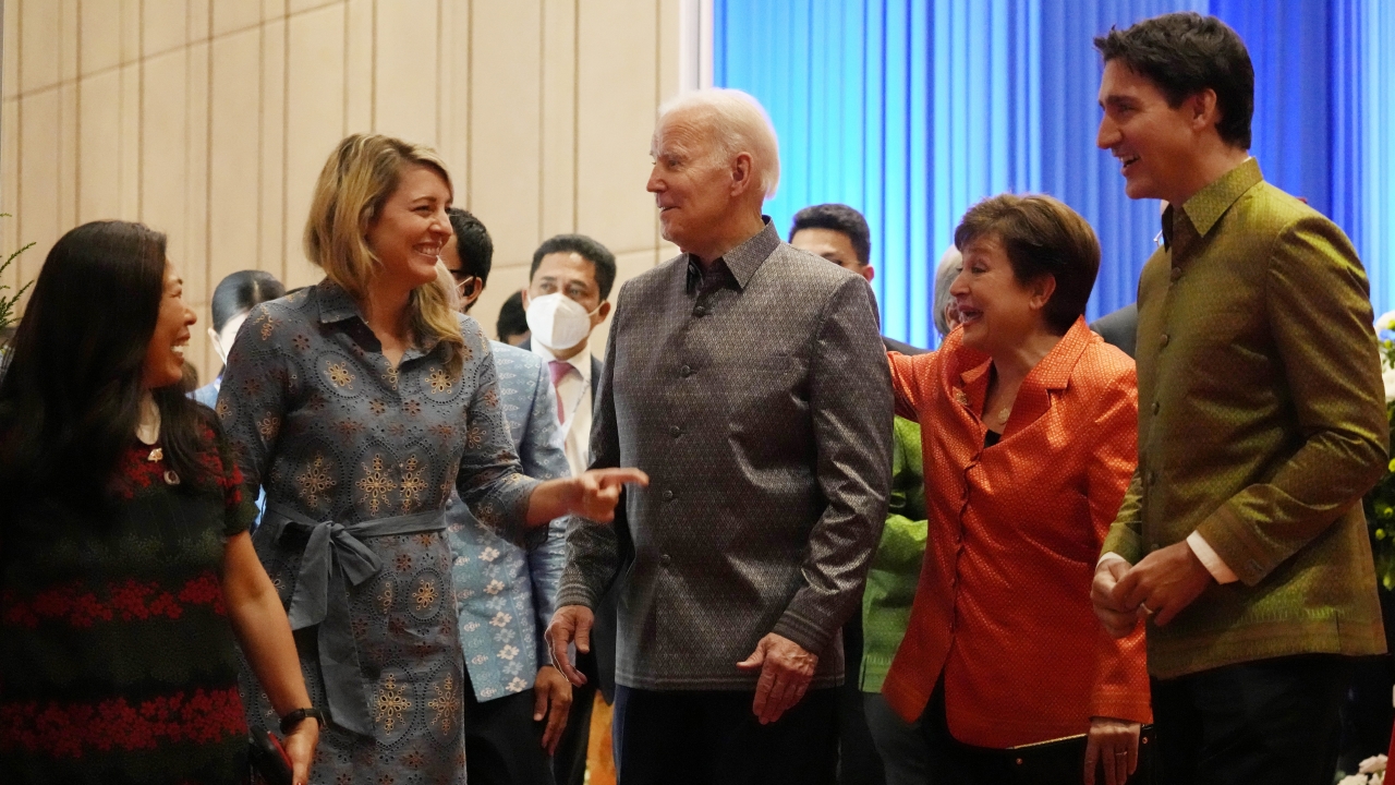 U.S. President Joe Biden speaks with Canada's Foreign Minister Melanie Holy.