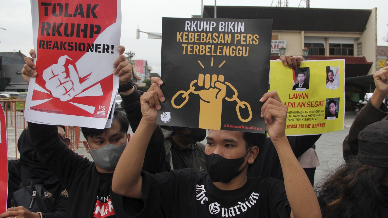 Activists protest Indonesia's new pre-marital sex restrictions.