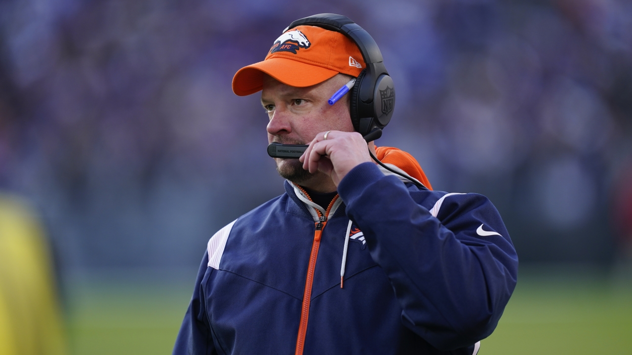 Denver Broncos head coach Nathaniel Hackett directs his team from the sideline.