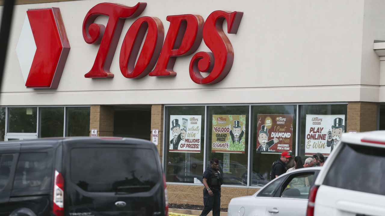 Tops Friendly Market in Buffalo, New York, surrounded by caution tape after a shooting.