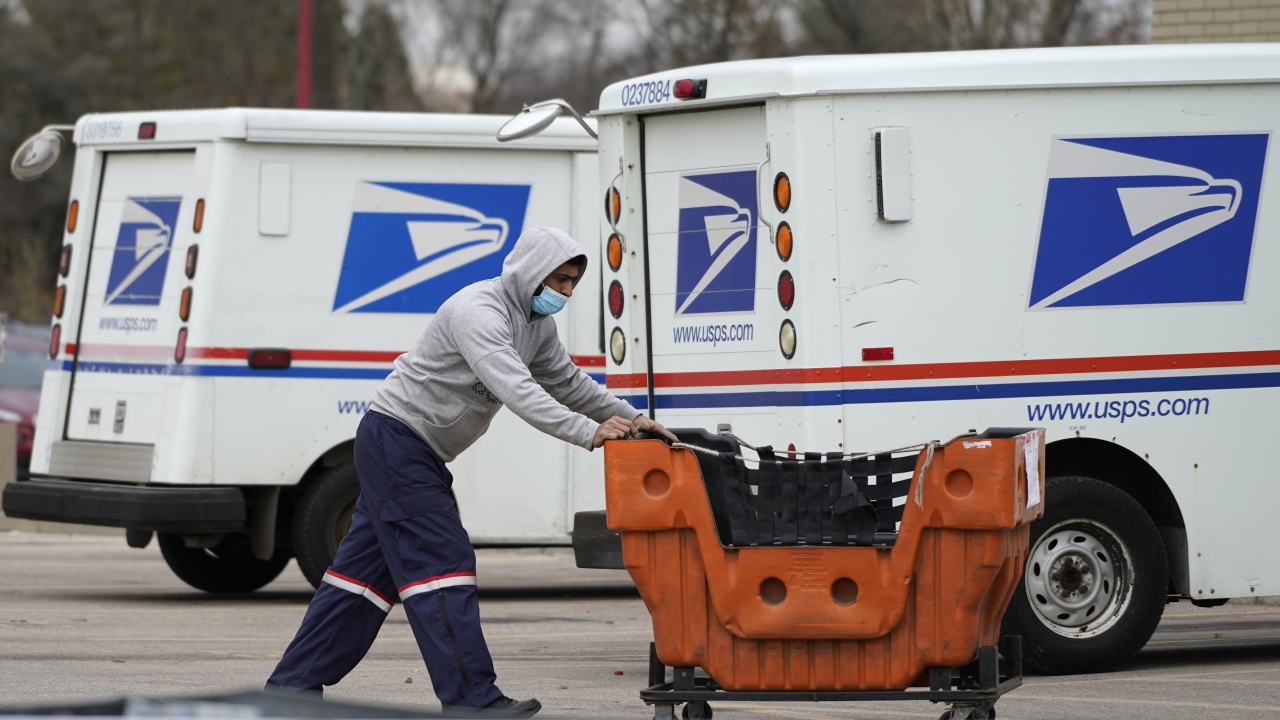 A U.S. Postal Service worker.