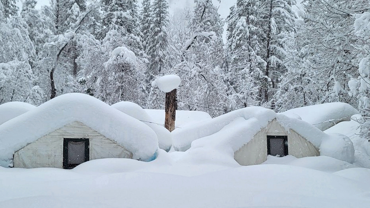 Tents at Curry Village covered with snow in Yosemite National Park.