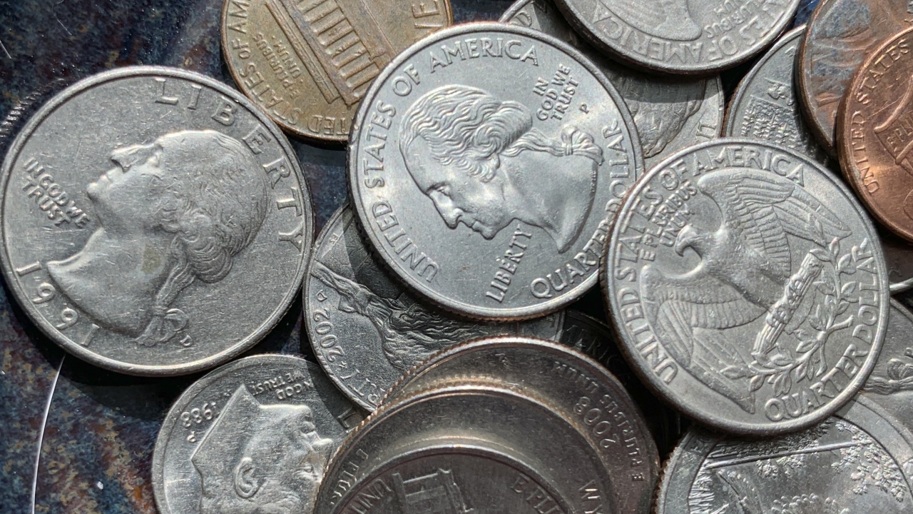 Quarters, nickels, dimes and pennies