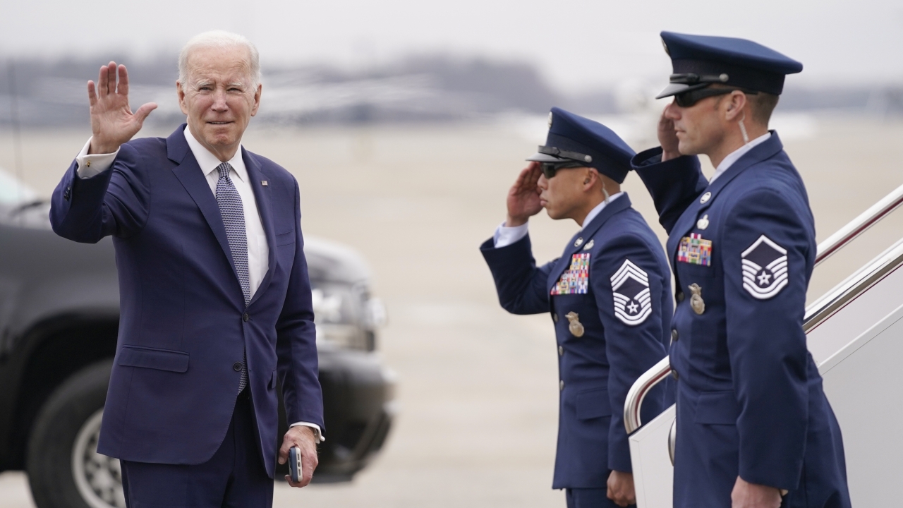 President Joe Biden waves before boarding Air Force On. (AP)