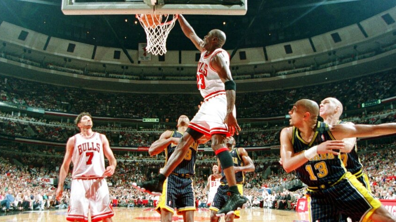 Michael Jordan goes up for a dunk against the Indiana Pacers in the 1998 NBA Playoffs.