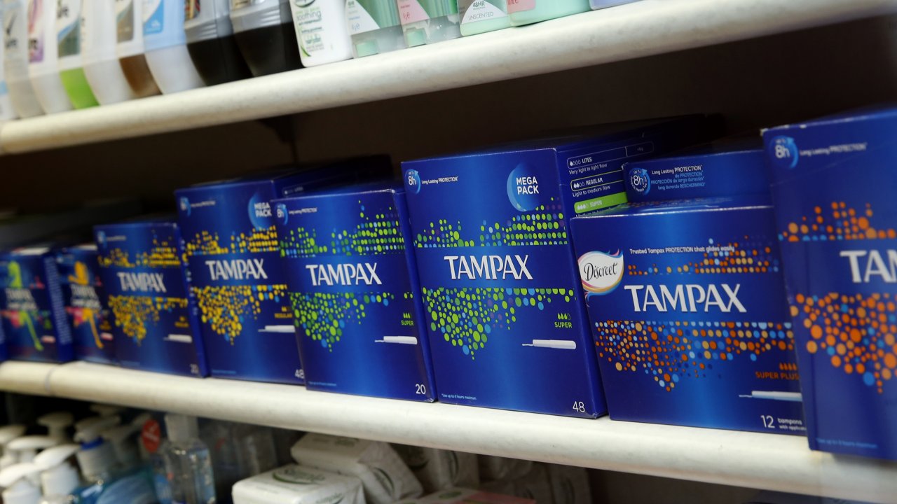 Women's sanitary products on sale at a small pharmacy.