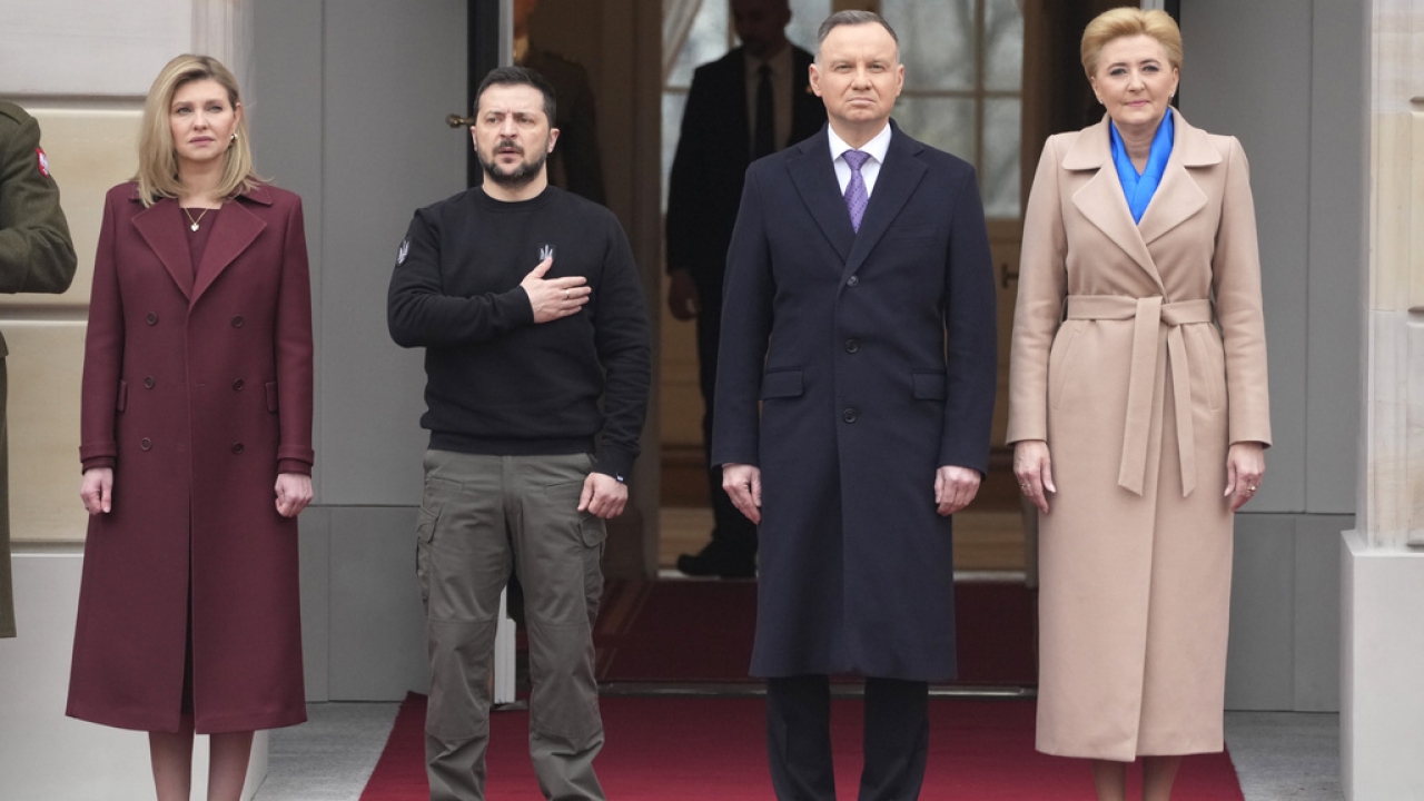 Polish President Andrzej Duda and wife Agata Kornhauser-Duda welcome Ukrainian President Volodymyr Zelenskyy and wife Olena.