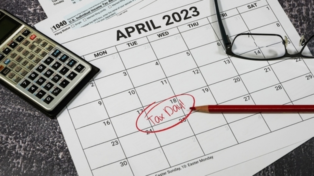 Calendar with Tax Day marked.