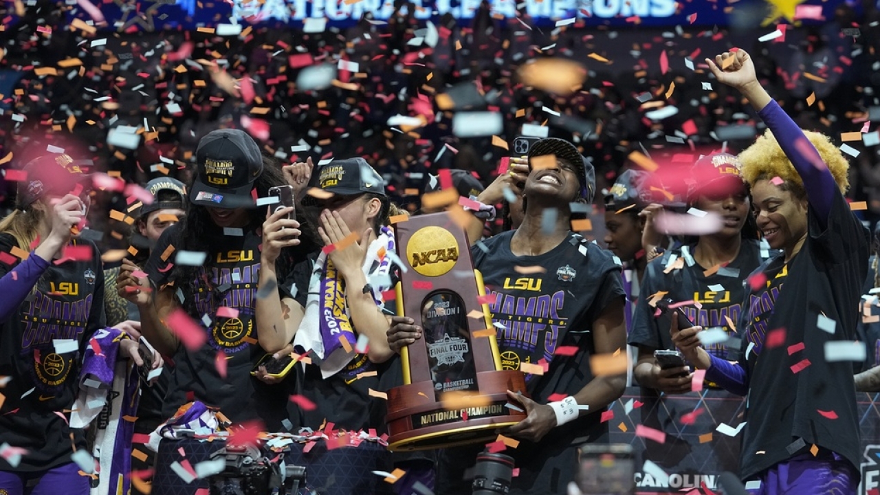 LSU players celebrate after the NCAA Women's Final Four championship basketball game against Iowa.