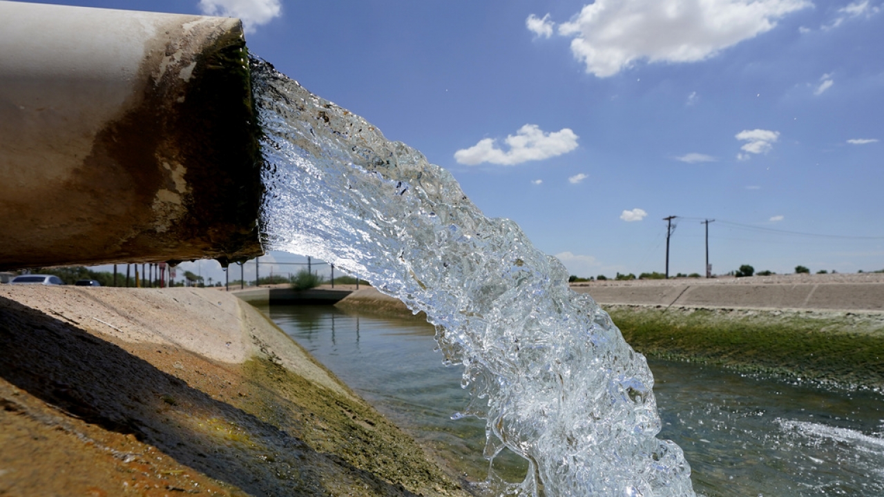 Water from the Colorado River diverted through the Central Arizona Project fills an irrigation canal.