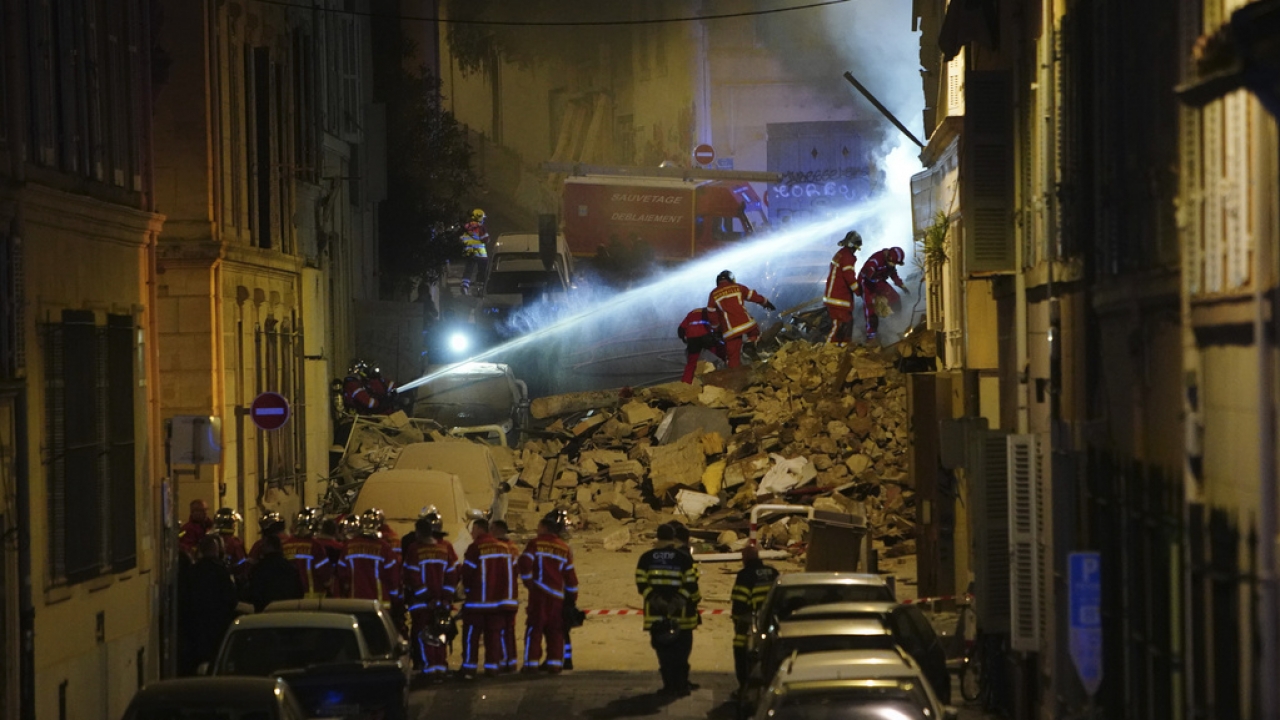 Firefighters work after building collapsed in Southern France