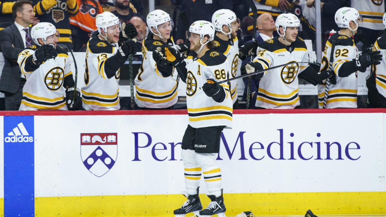 Boston Bruins' David Pastrnak celebrates his third goal of a game.