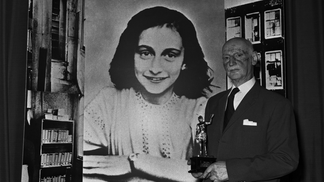Dr. Otto Frank holds the Golden Pan award, given for the sale of one million copies of "The Diary of Anne Frank".