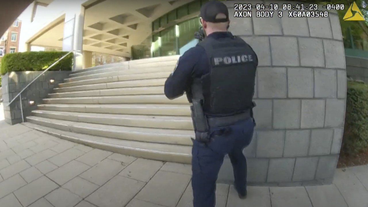 Screen grab taken from the body cam video of officer responding to Louisville bank shooting