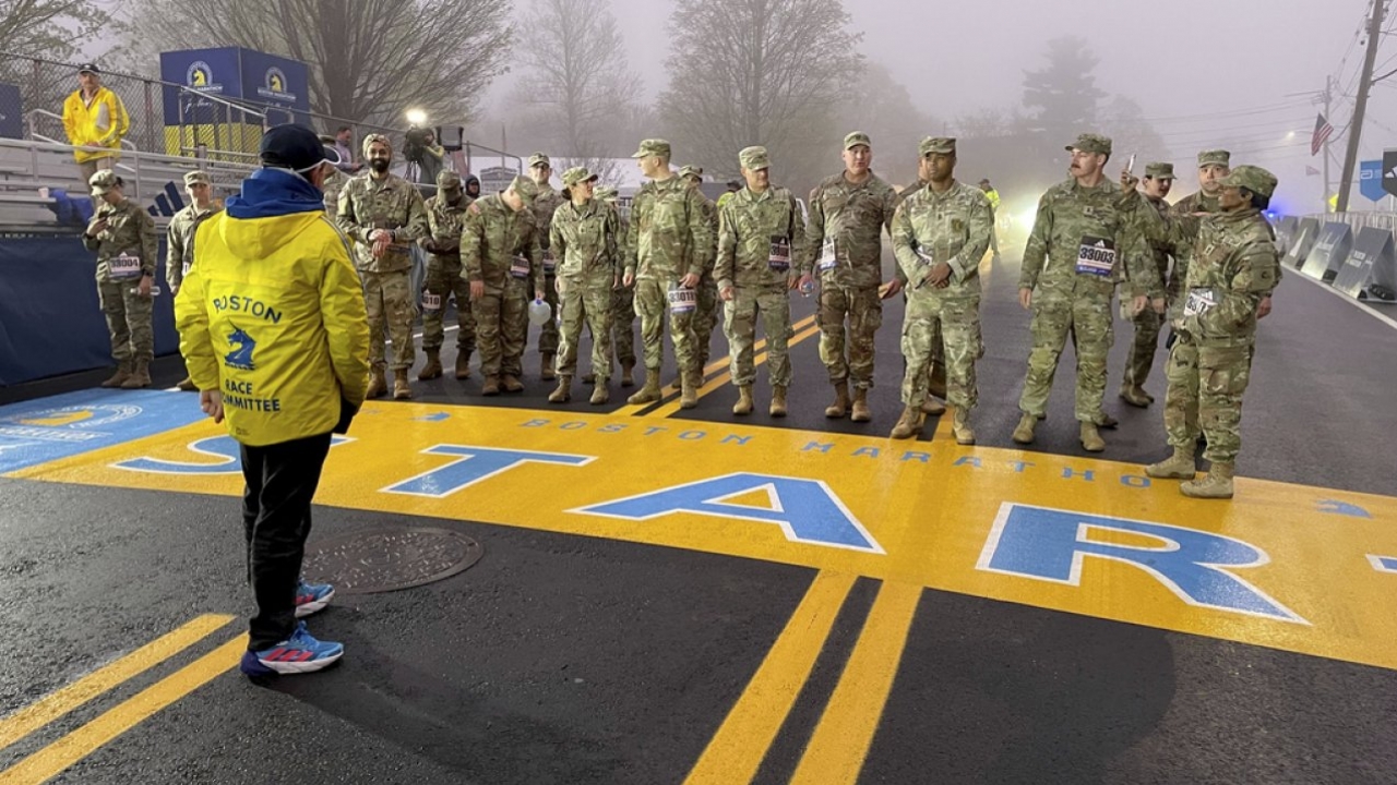 Boston Marathon Race Director Dave McGillivray sends out a group of about 20 from the Massachusetts National Guard