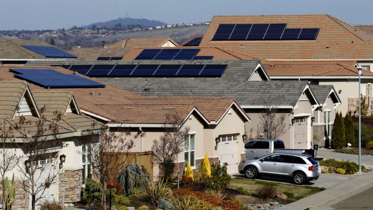 Homes with solar panels on their roofs