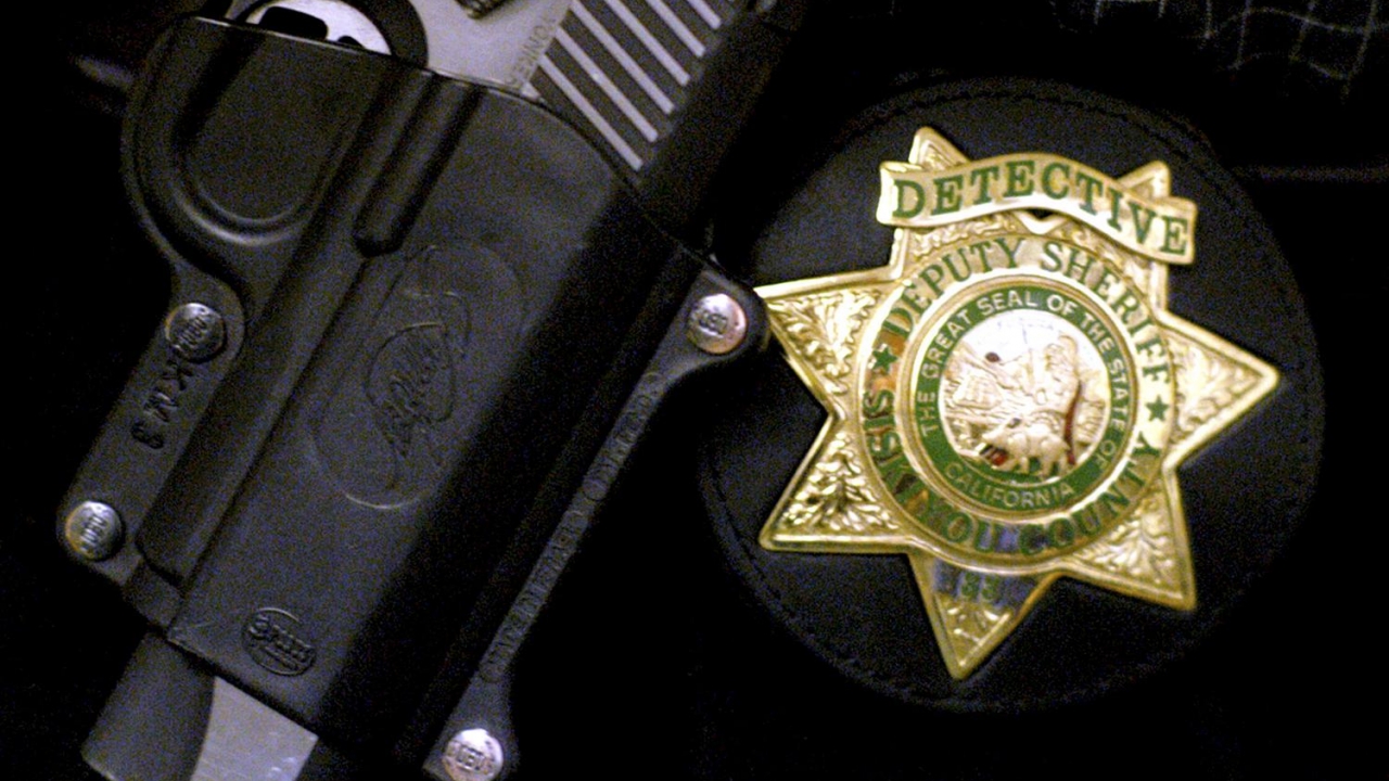 Siskiyou County Deputy Sheriff badge and gun