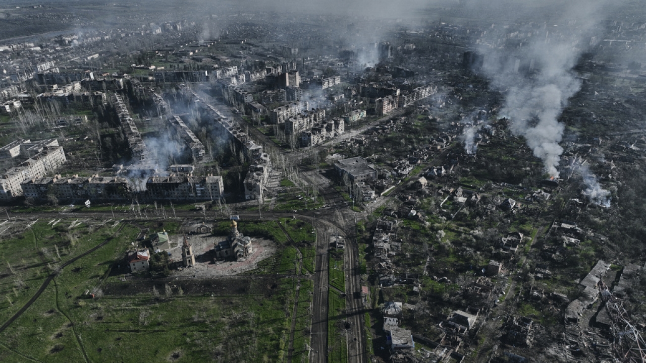 Smoke rises from buildings in this aerial view of Bakhmut.
