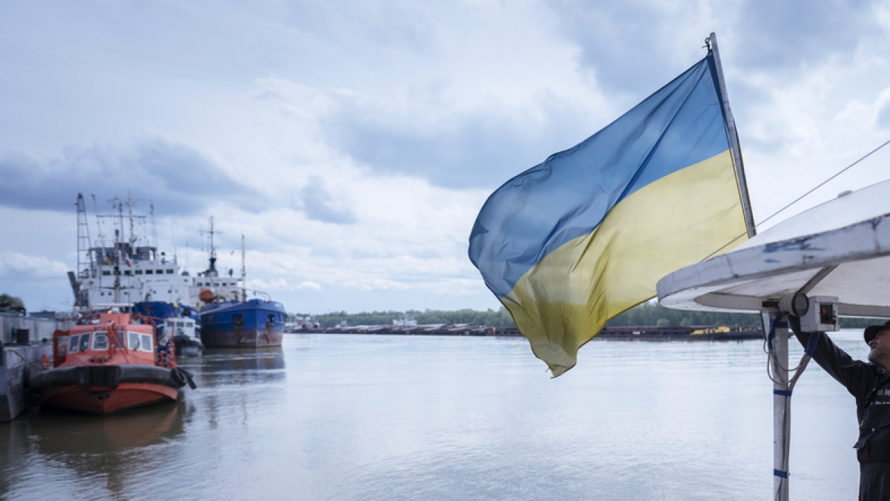 Ukrainian flag hangs from a boat.