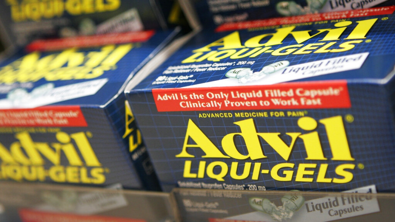 Advil products on store shelf.