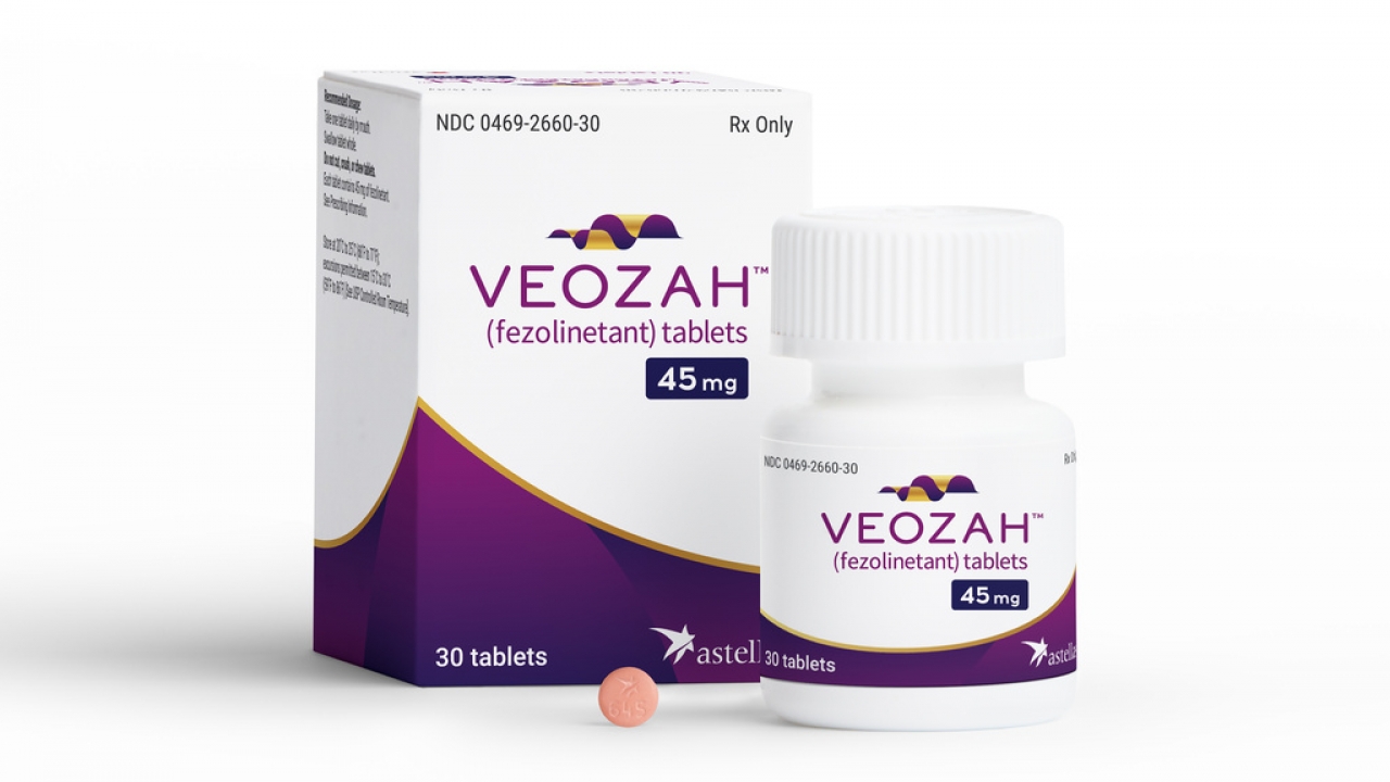 A box and container of Veozah drug are displayed.