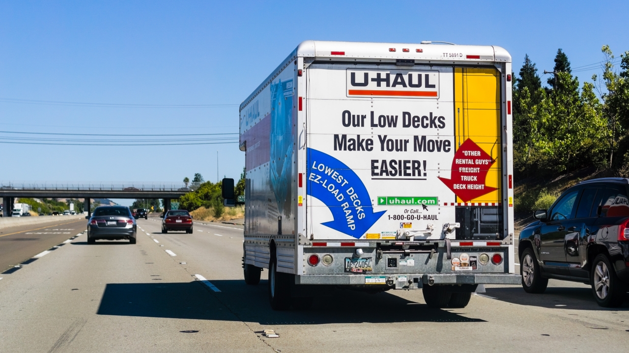 A U-Haul truck on a highway