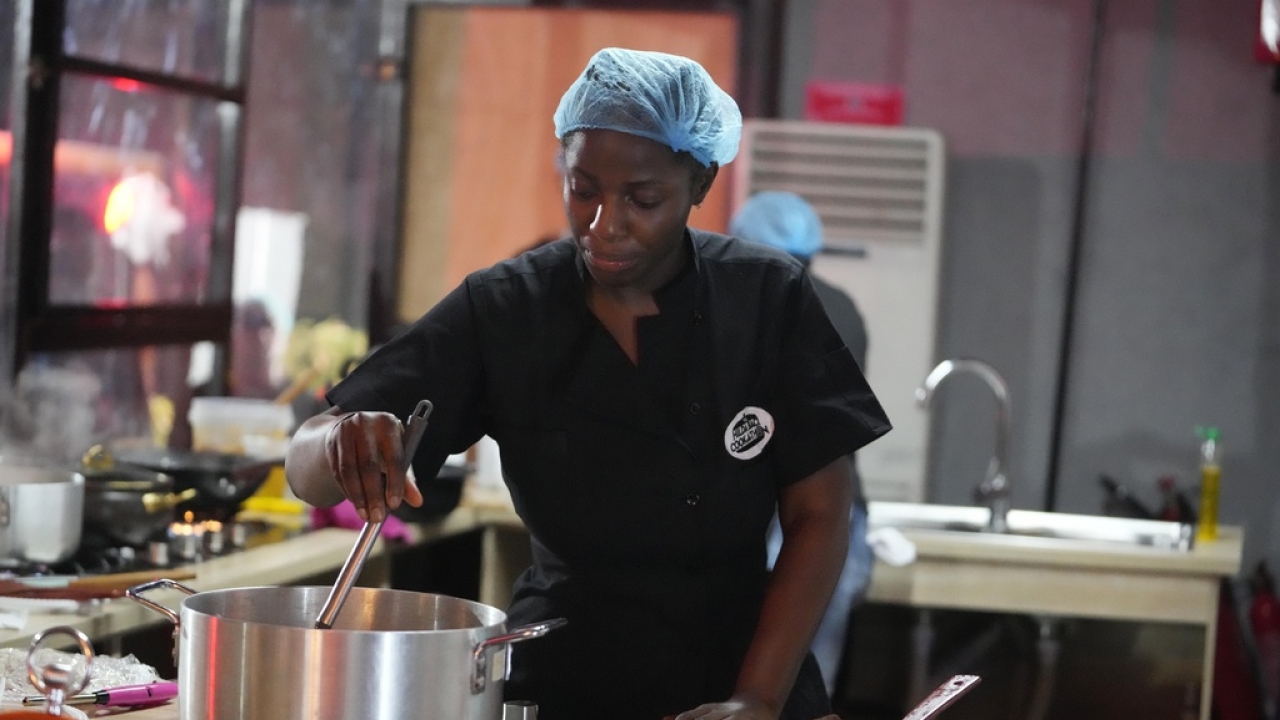 Nigerian Chef Hilda Baci cooks in her kitchen.