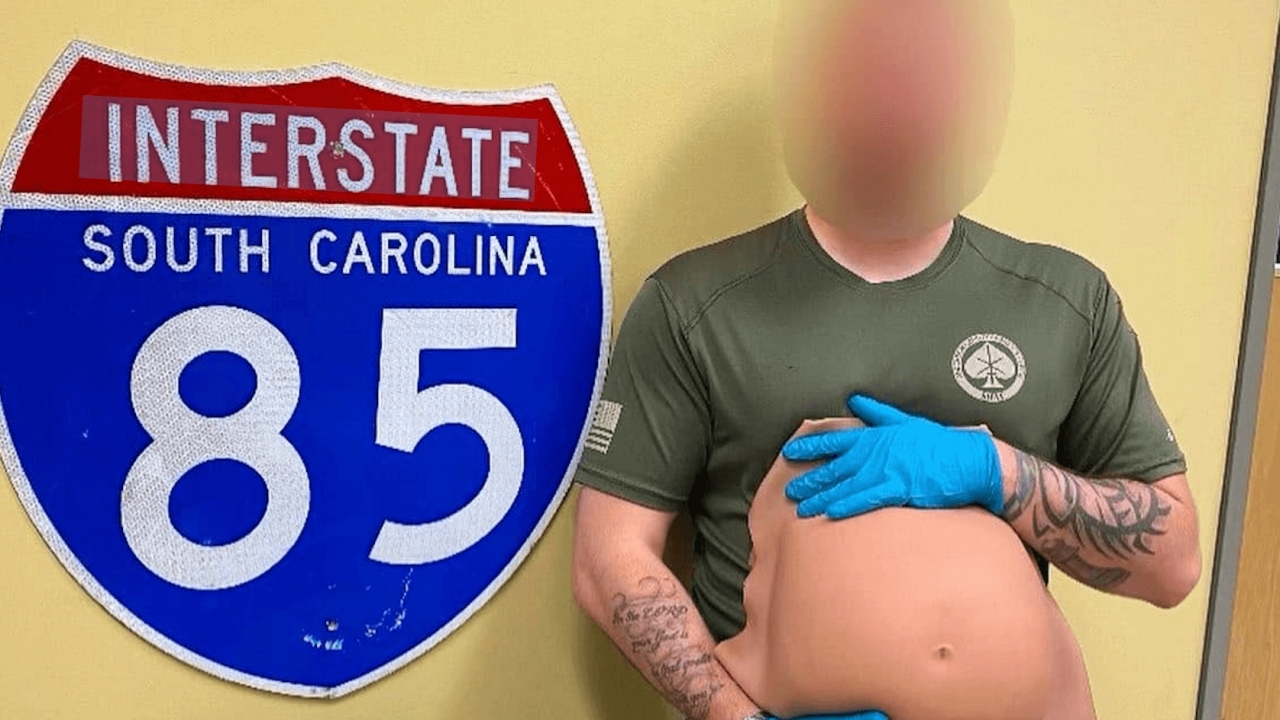 Deputy holds up rubber pregnancy belly that was used to hide cocaine