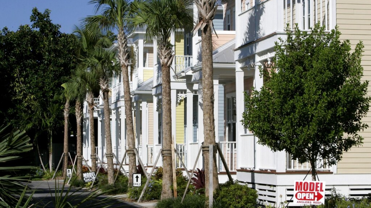 Newly built homes designed after Key West-style architecture on sale.