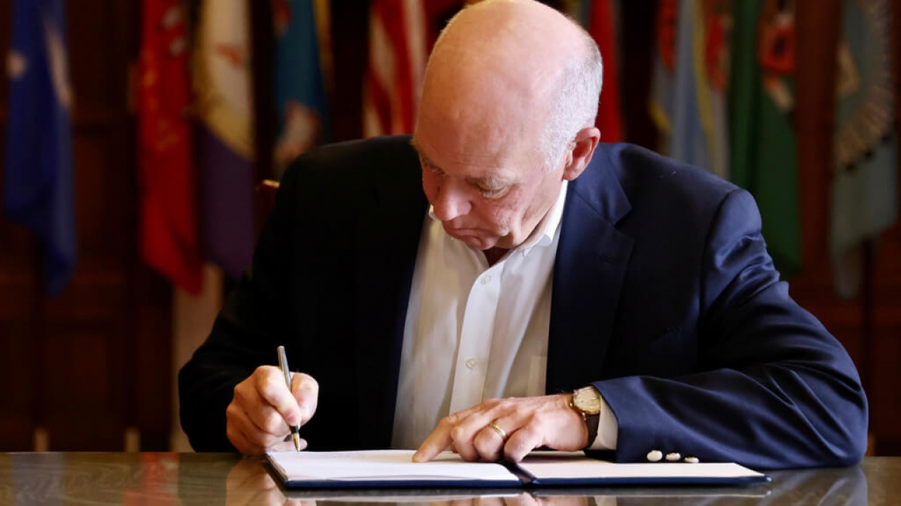Montana Gov. Greg Gianforte signs a law banning TikTok in the state