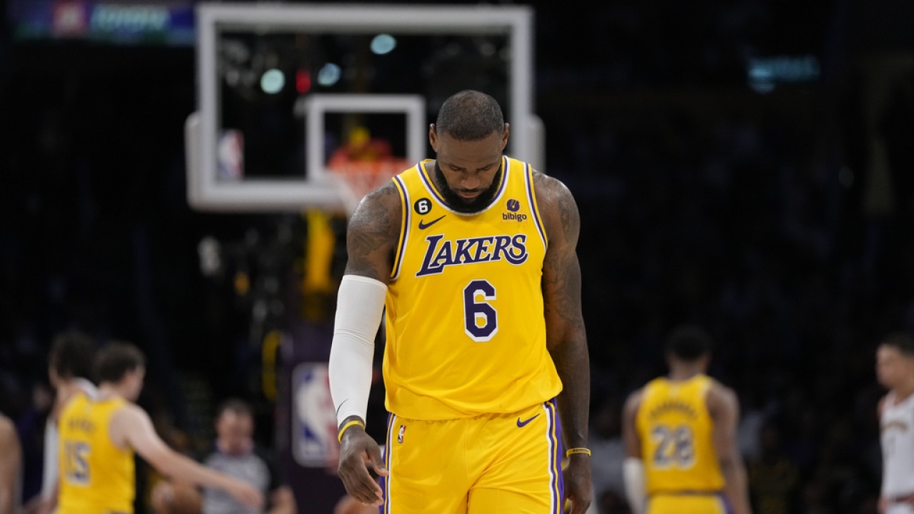 Los Angeles Lakers forward LeBron James looks down in the closing minutes of a loss to the Denver Nuggets.