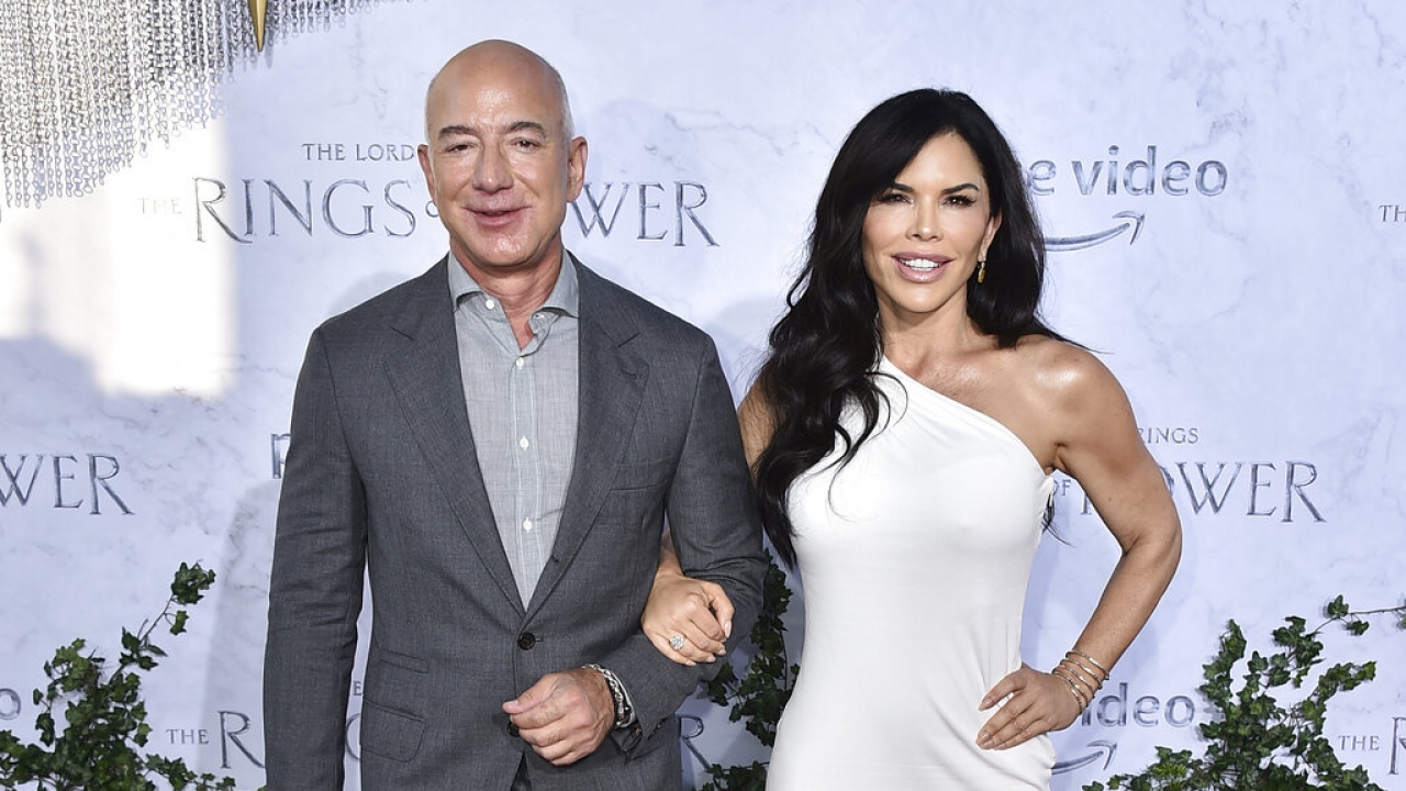 Jeff Bezos, left, and Lauren Sanchez arrive at the premiere of "The Lord of the Rings: The Rings of Power."