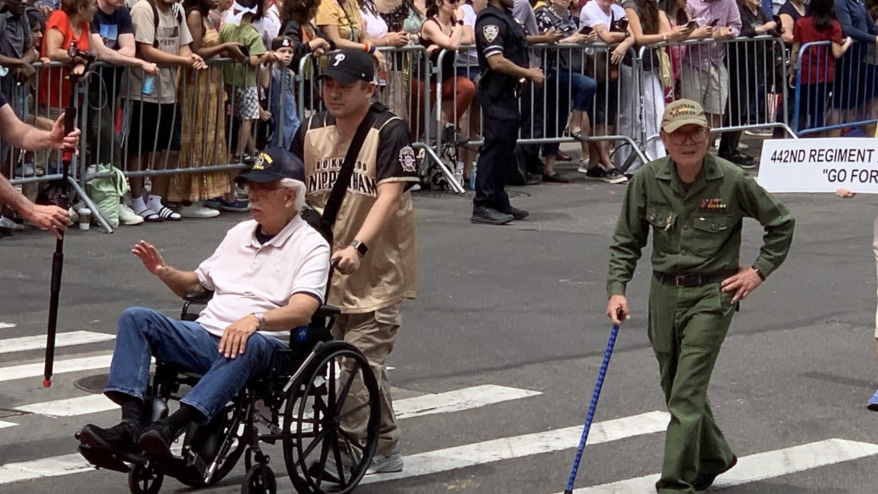 U.S. Army vet Tak Furumoto, right,  in the Japan Day parade.