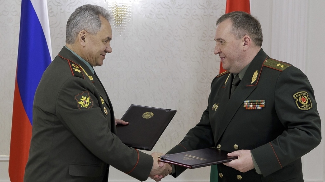 Russian Defense Minister Sergei Shoigu, left, and Belarusian Defense Minister Viktor Khrenin.