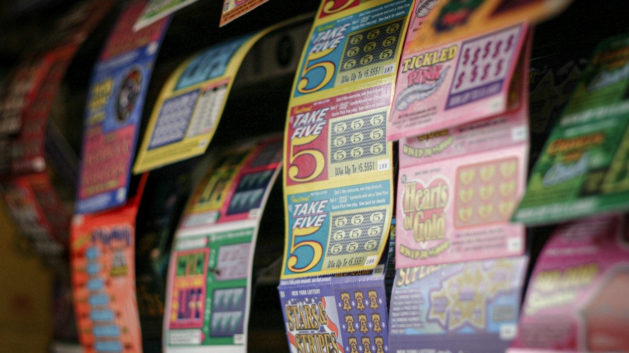 A display of hanging scratch-off lottery tickets