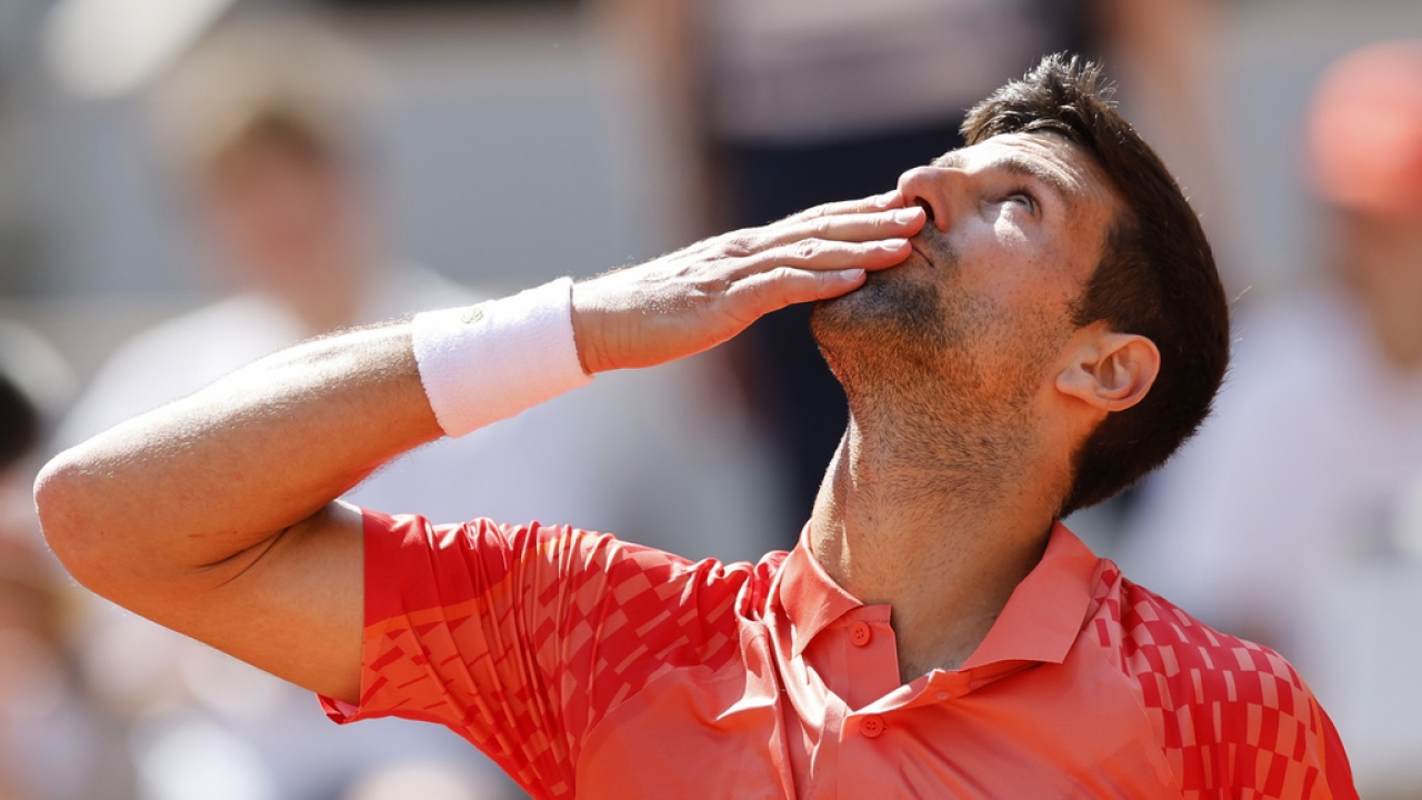 Serbia's Novak Djokovic celebrates after winning the first round match of the French Open tennis tournament.