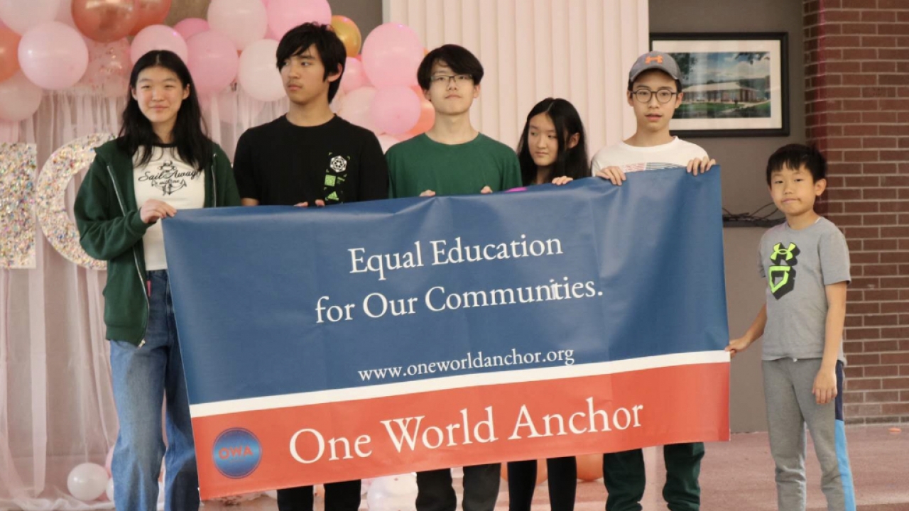 Sophia Jiang, far left, with students at One World Anchor.