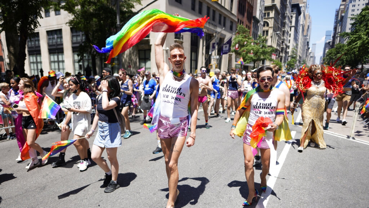 Parade-goers participate in the NYC Pride March.