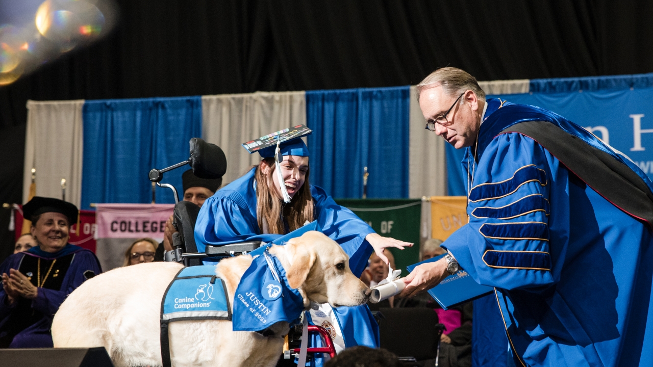 Justin the service dog receives his diplomas at Seton Hall University, New Jersey.