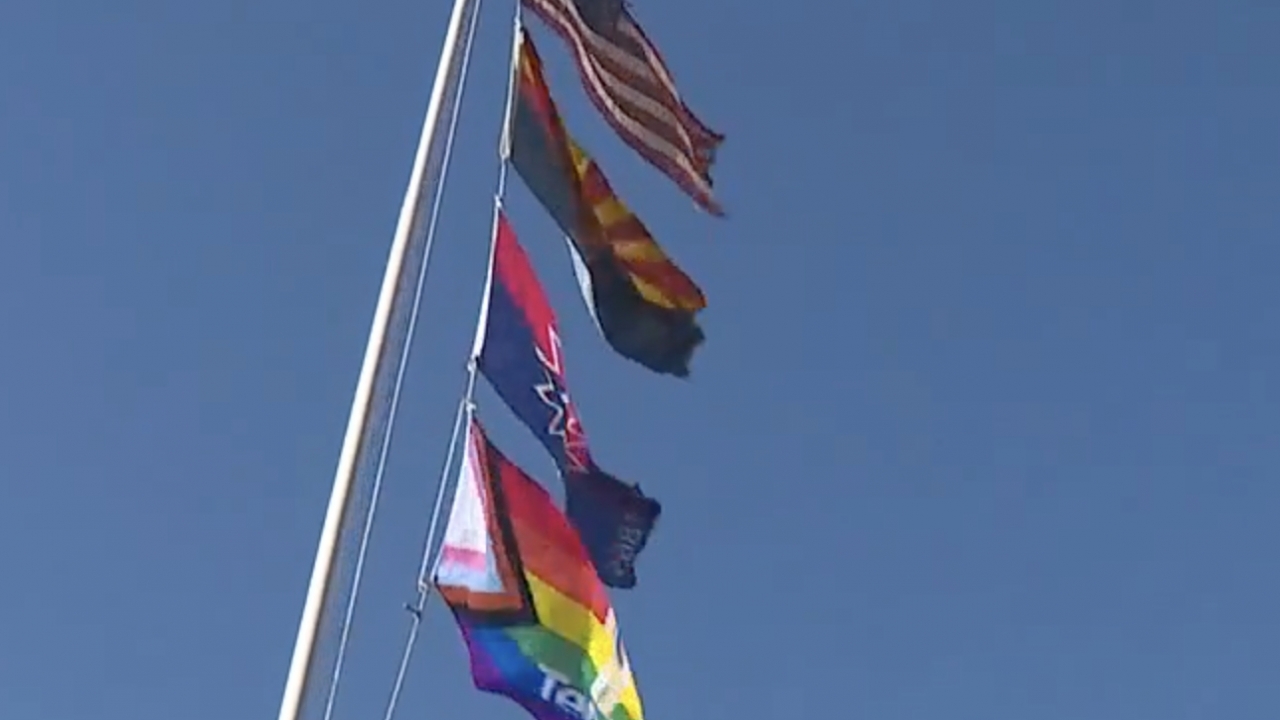 Flags fly at Tempe City Hall.