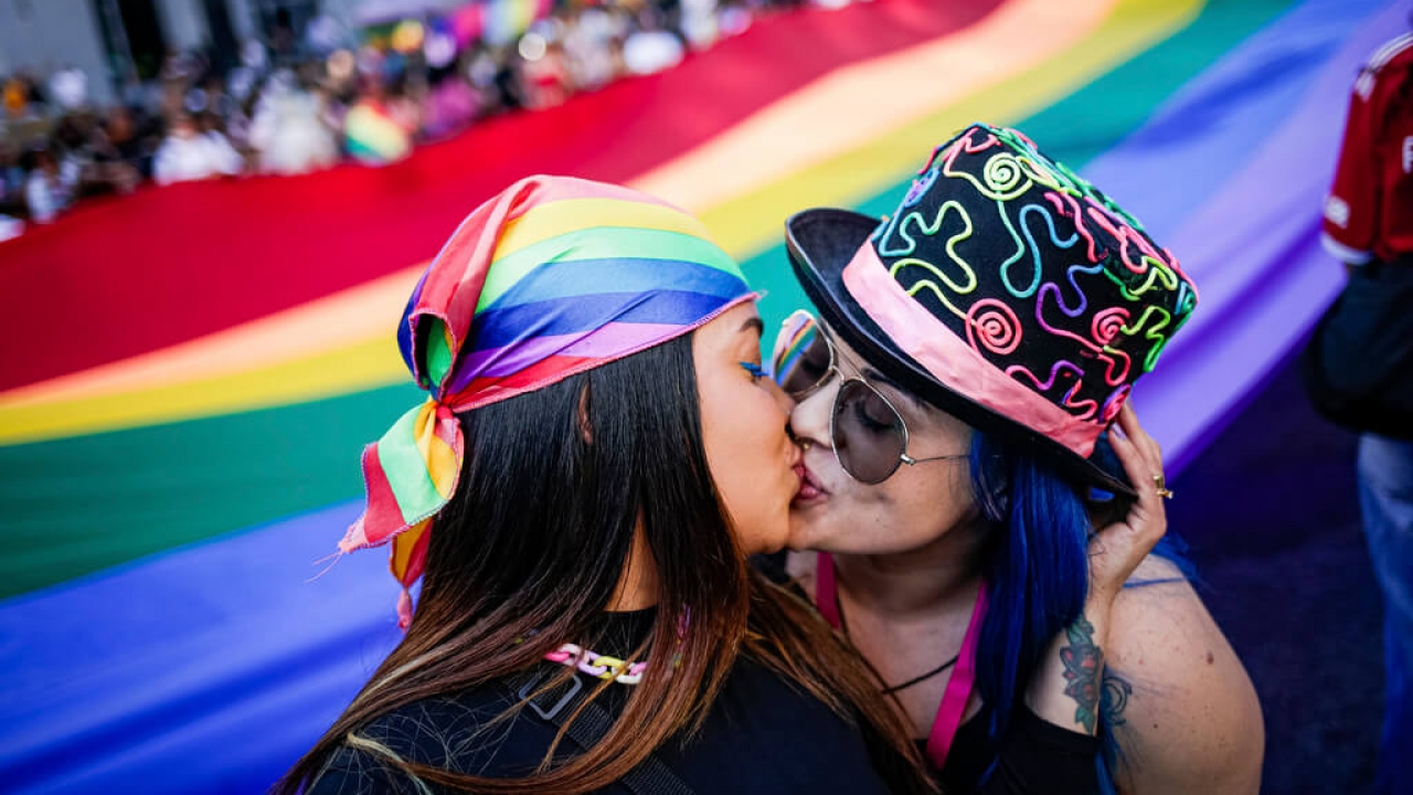 Participants kiss during the annual Gay Pride Parade.