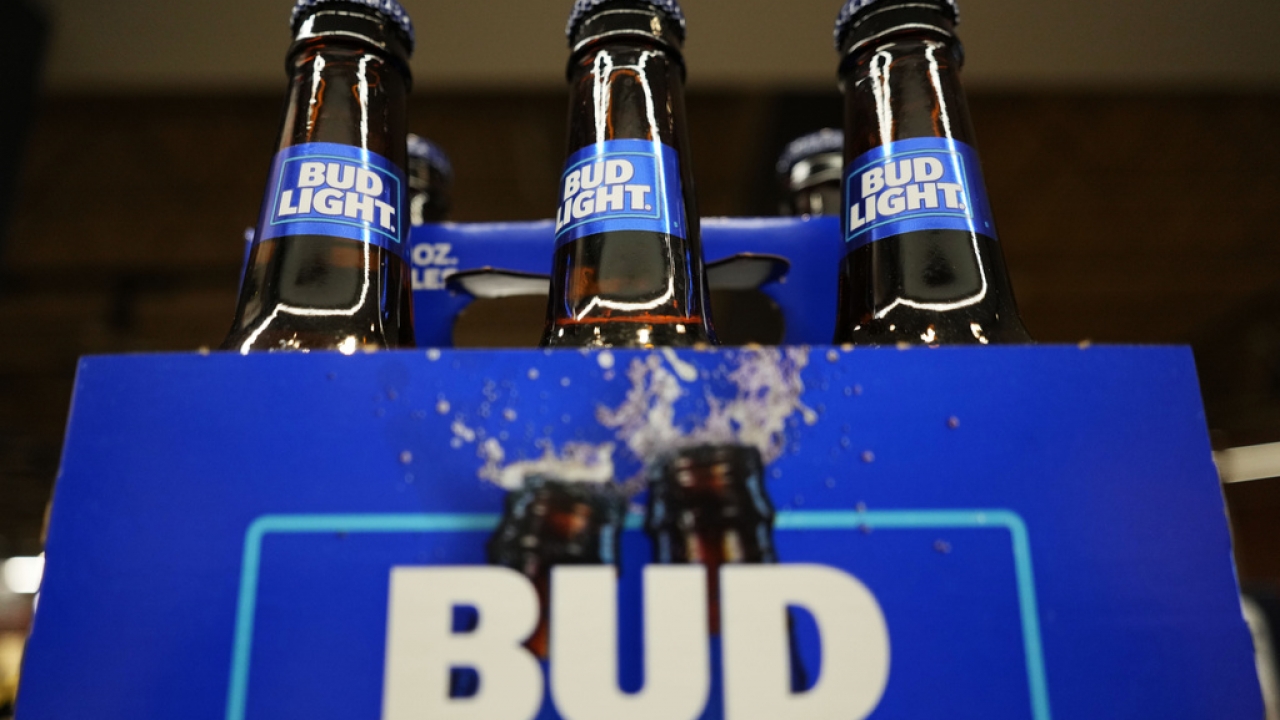 Bottles of Bud Light beer at a grocery store