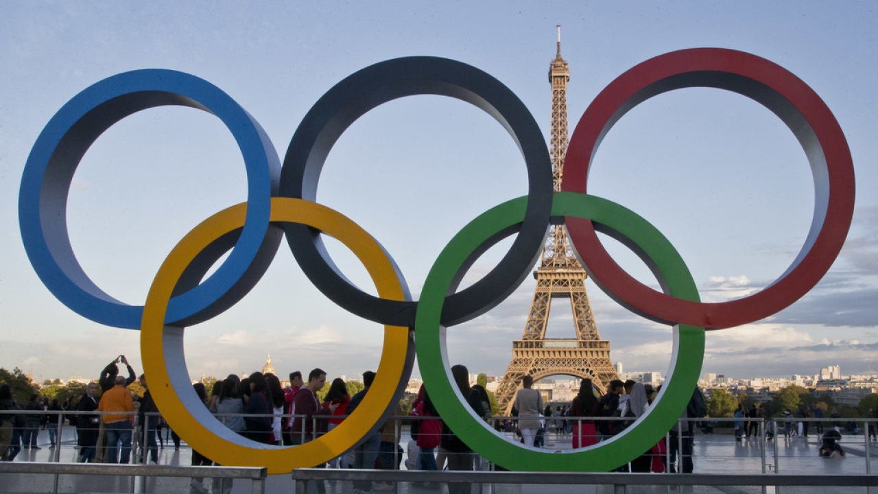 The Olympic rings are set up in Paris, France, Thursday, Sept. 14, 2017 at Trocadero plaza that overlooks the Eiffel Tower.